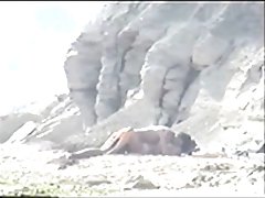 Shy couple caught on the nudist beach