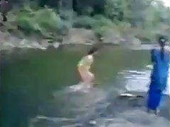 Indian girl in river with theri bfs