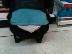 Mature woman showing white thong