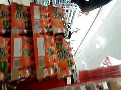 Upskirt cute teen looking for candy