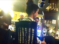 candid shoeplay at bar