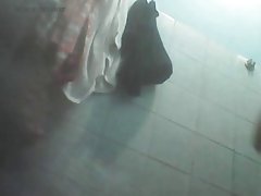 indonesian girl taking a bath