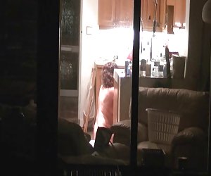 Neighbour in her kitchen