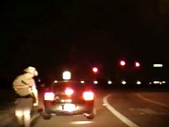 Female US Cop Giving Two Women Body Cavity