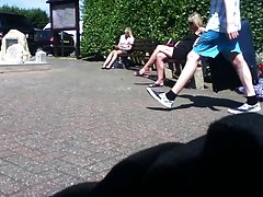 Blonde lady dangling her sandals