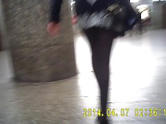 Upskirt girl in opaque black tights